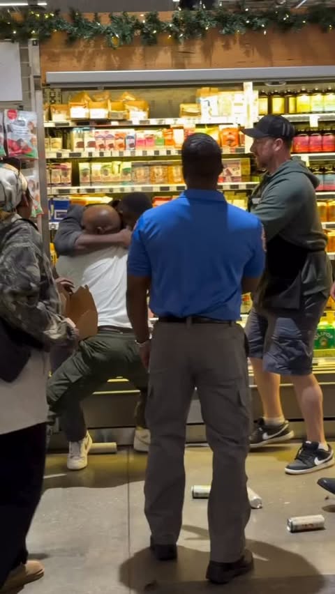 Instagram post by @fightmovies for Whole Foods Market. Caption reads: Takedown in @wholefoods 🛒 by an angry customer....