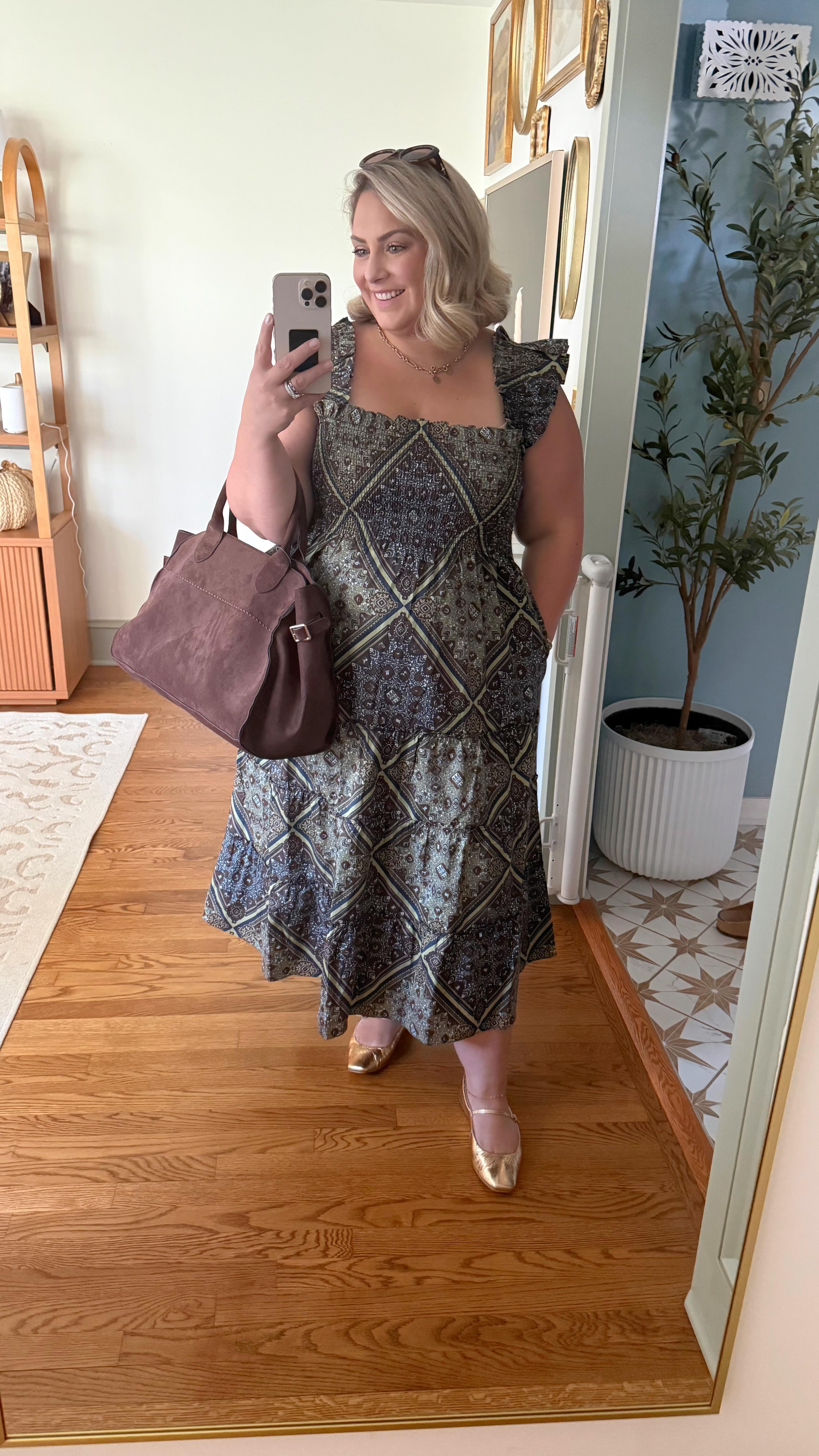 Instagram post by @everythingemilyann for Hill House Home. Caption reads: When your favorite fall dress is 20% off🍁🎉....