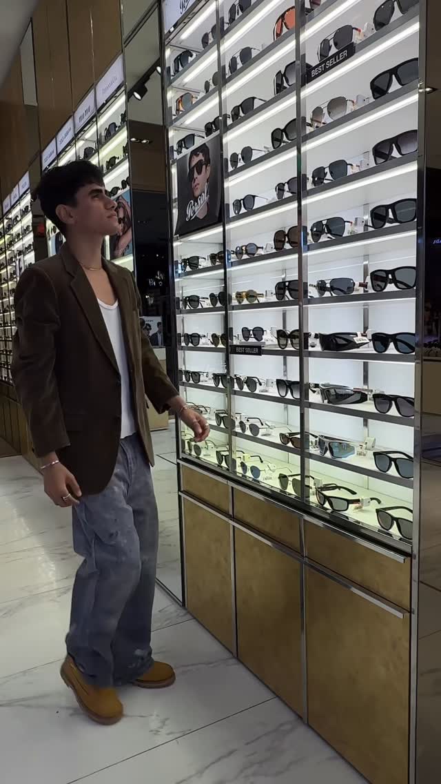Instagram post by @muhamedrachwan for Sunglass Hut. Caption reads: @sunglasshut 
Shopping at Sunglass Hut means more....