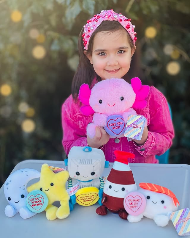 Instagram post by @little_amaya_in_wonderland for Swizzels. Caption reads: AD| Everyone loves Swizzels Love Hearts

They are....