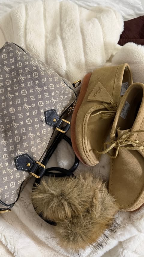 Instagram post by @the_diaries_of_nakiah for Clarks Originals. Caption reads: My version of a lazy sweats and white tee....