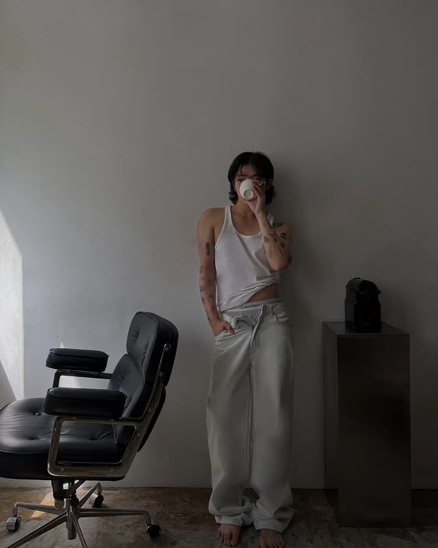 Instagram post by @hhiroyx for Calvin Klein. Caption reads: morning in my ck baggy denim @calvinklein.