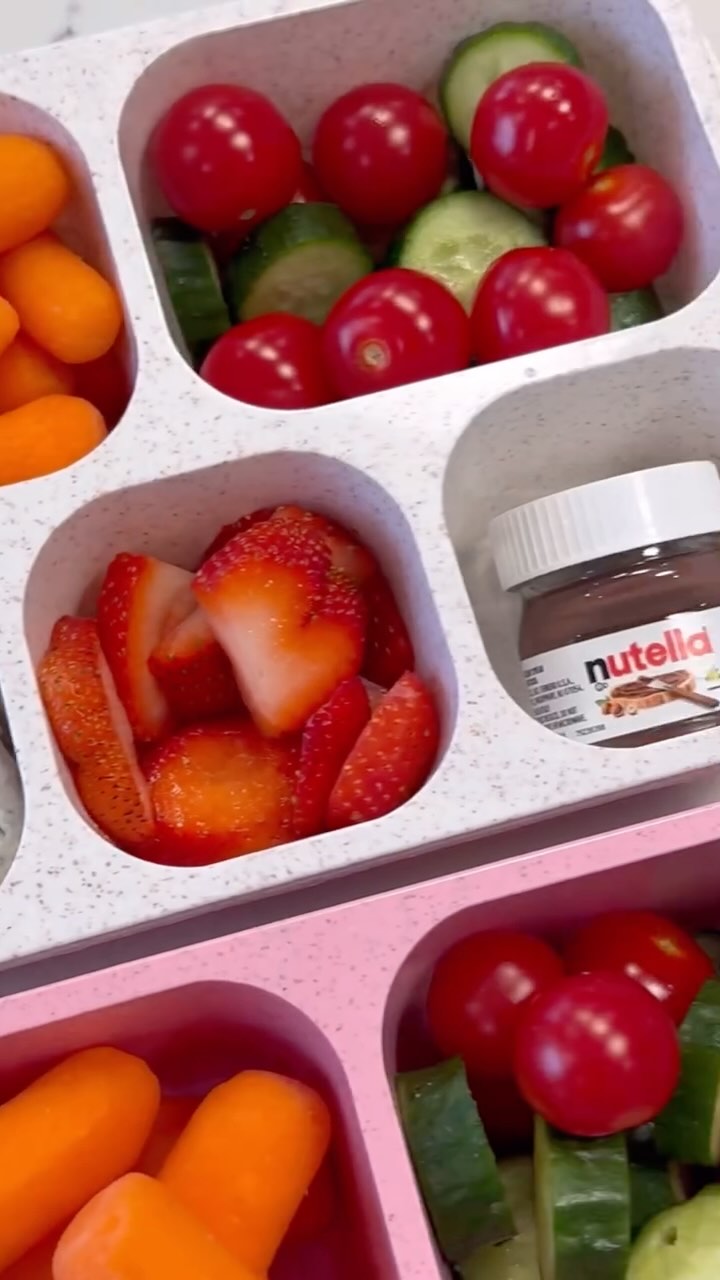 Instagram post by @kate_cleanhome for Chomps. Caption reads: [...] your own lunchables 🍓🥰🫶🏻 @chomps....