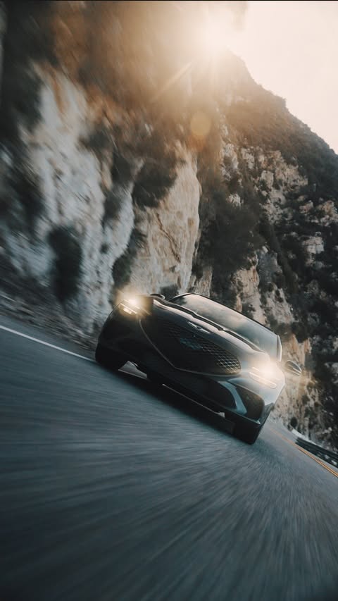 Instagram post by @pollockpictures for Genesis USA. Caption reads: [...] of a winding highway, that is;) #GenesisUSA....
