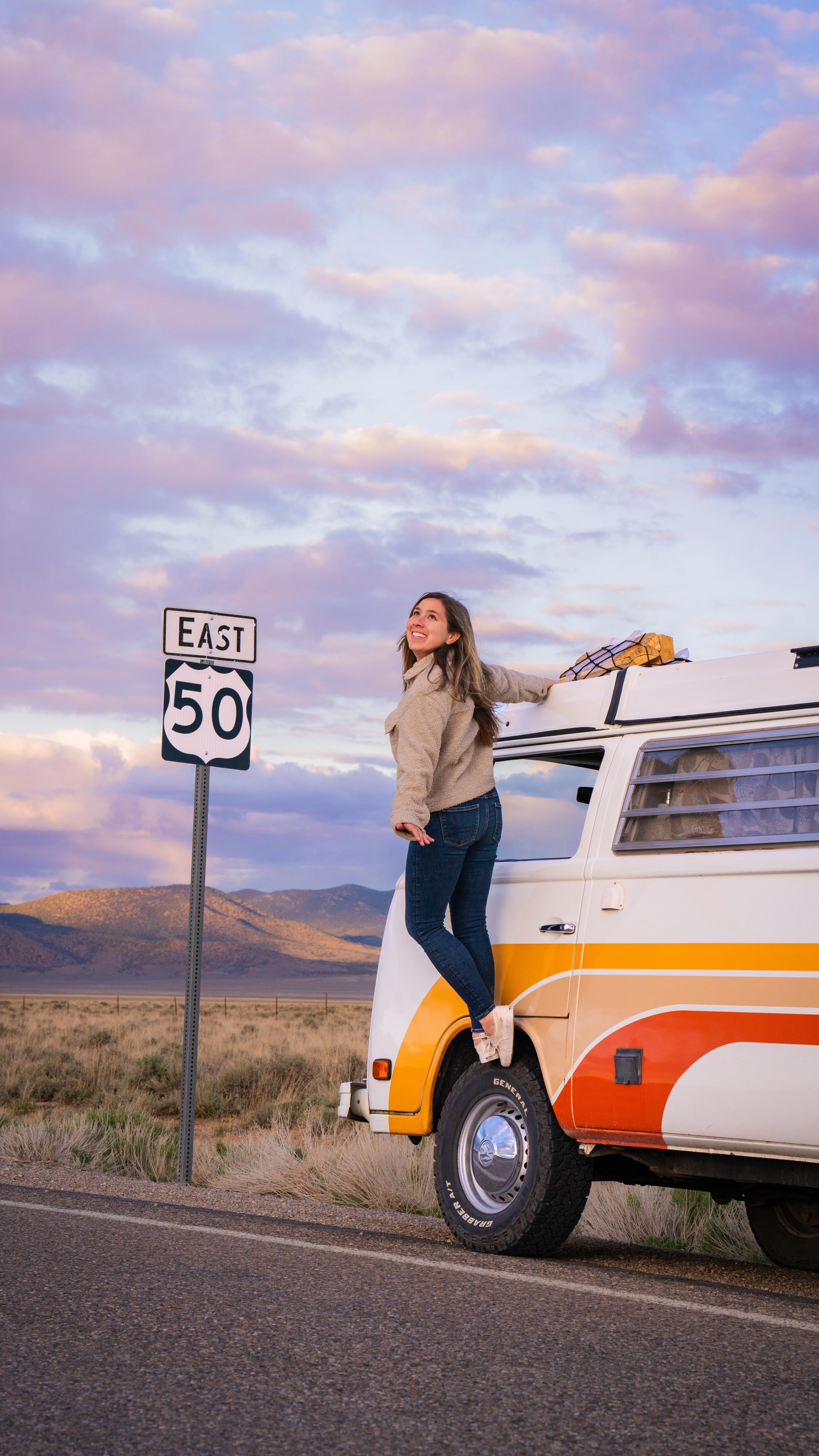Instagram post by @packthebus for Travel Nevada. Caption reads: There’s something surreal about the open roads of....