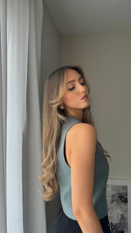 Instagram post by an influencer for Marks & Spencer. Caption reads: Hair grwm 🤍 This is my go to hair routine using....