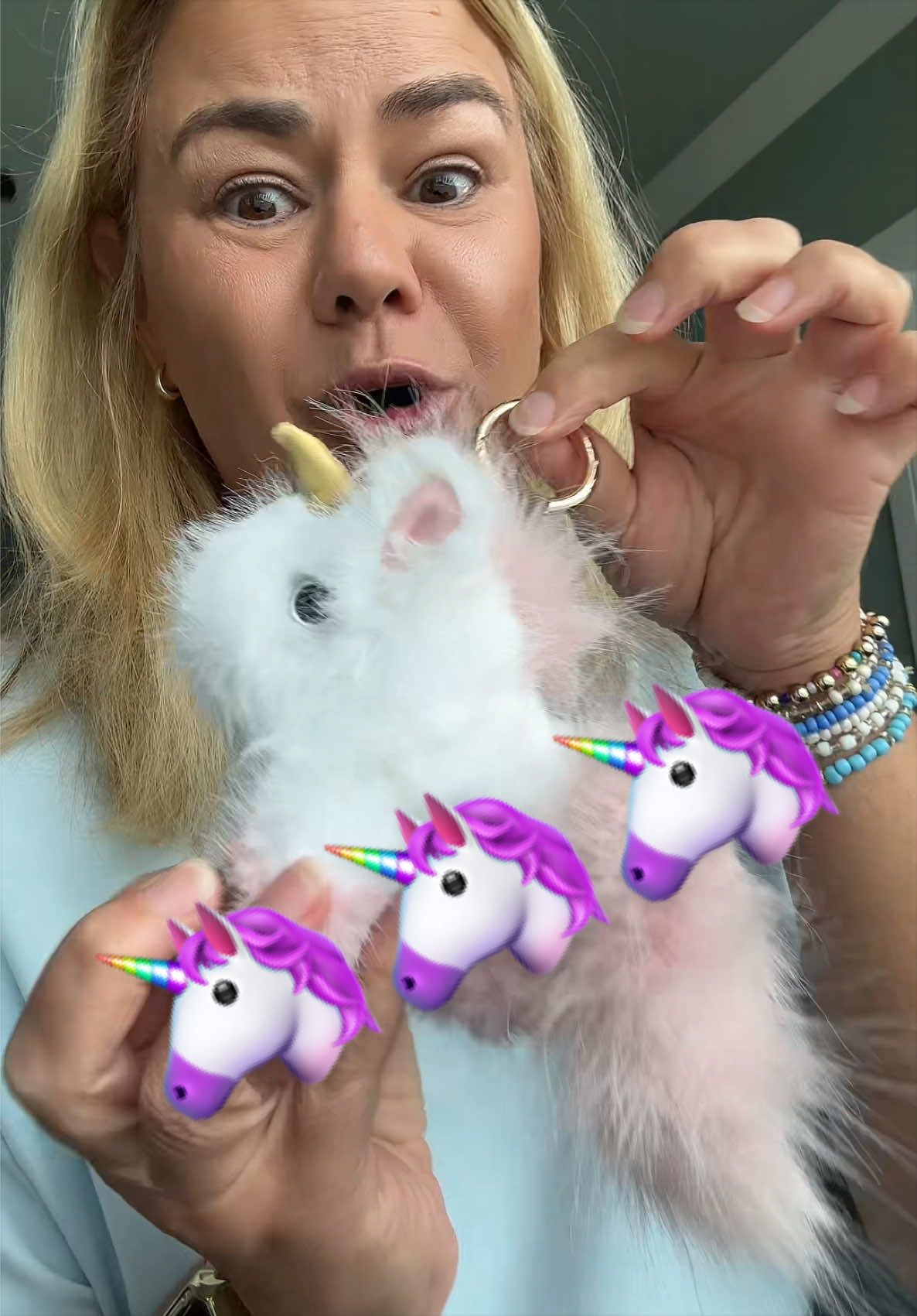 TikTok post by @magen.16 for Bunnylulu. Caption reads: BunnyLulu Whimsical Unicorn Plush Keychain, [...].