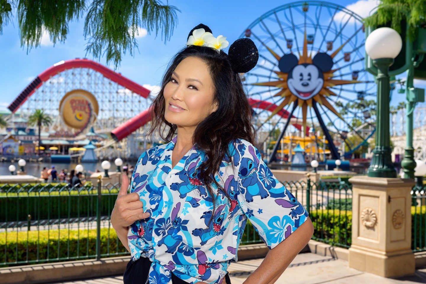 Instagram post by @tiacarrere for Disney Parks. Caption reads: Tia Carrere stopped by Disney California Adventure....