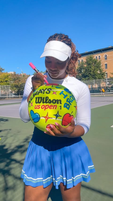 Instagram post by @oliviaellis.studio for Wilson Sporting Goods. Caption reads: Took this JUMBO @wilson souvenir home with me from....