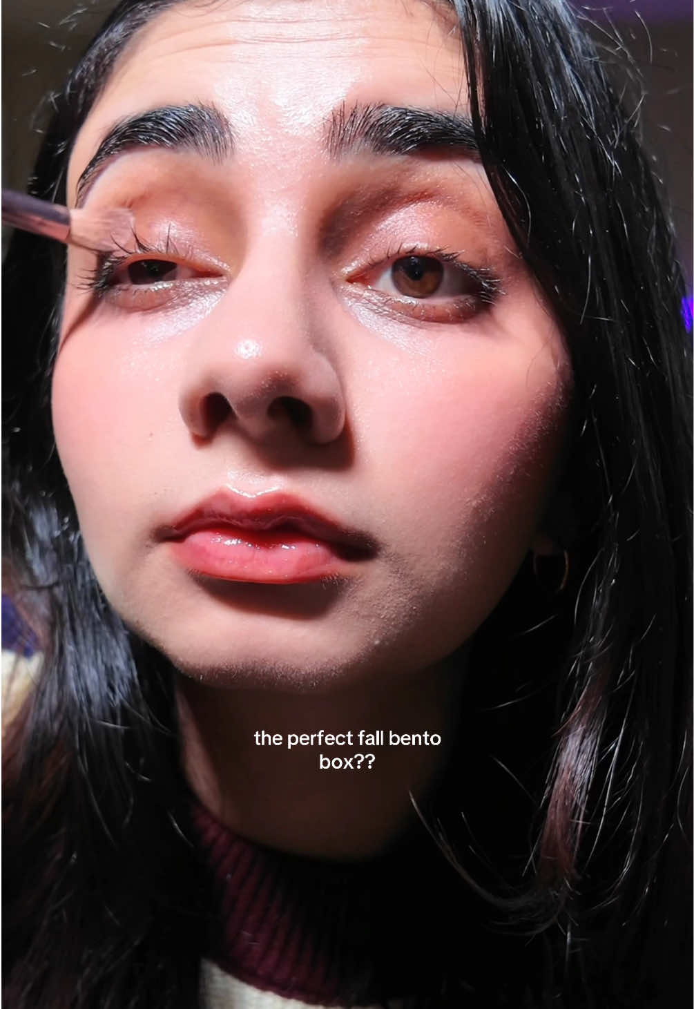 TikTok post by @ishasallll for Kaja Beauty. Caption reads: [...] purple accents are so me🦋 @Kaja Beauty....