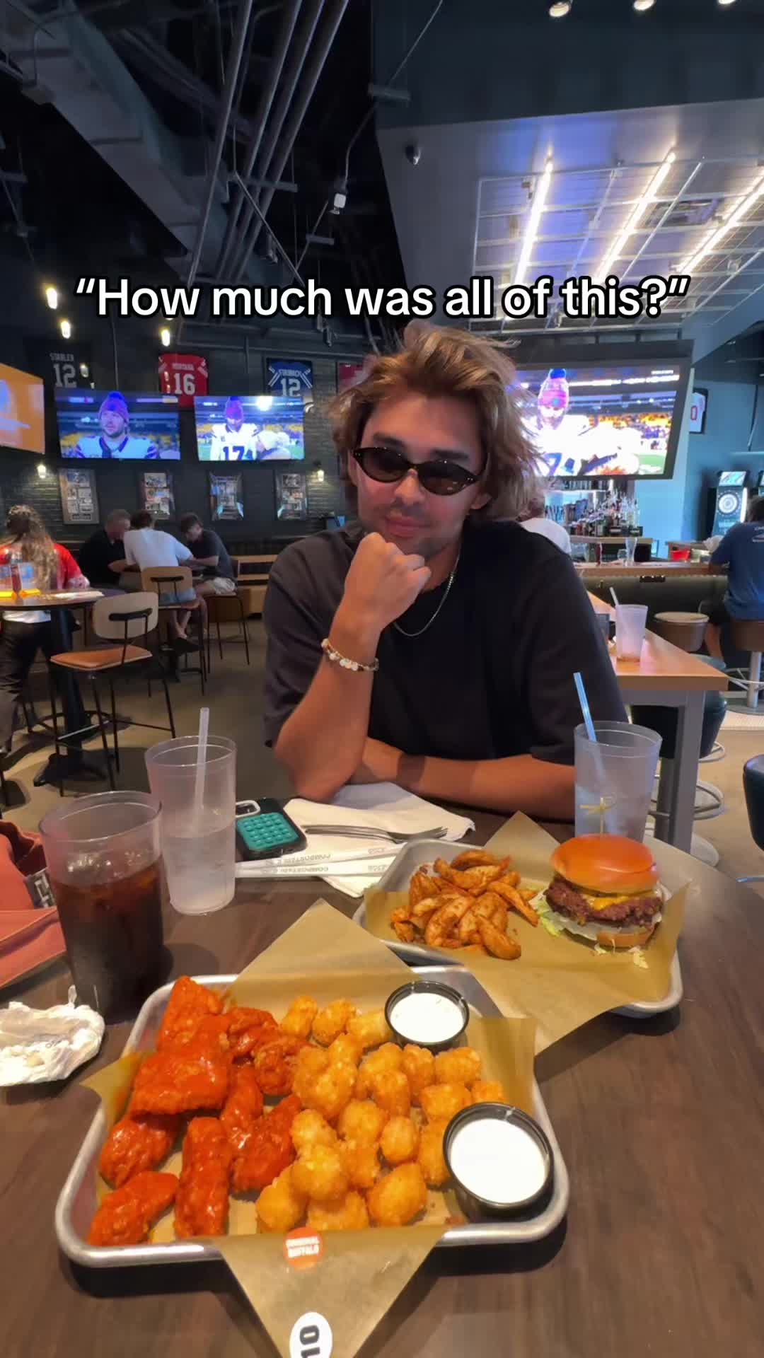 TikTok post by @tyycollins for Buffalo Wild Wings. Caption reads: Munch @Buffalo Wild Wings #buffalowildwingspartner....