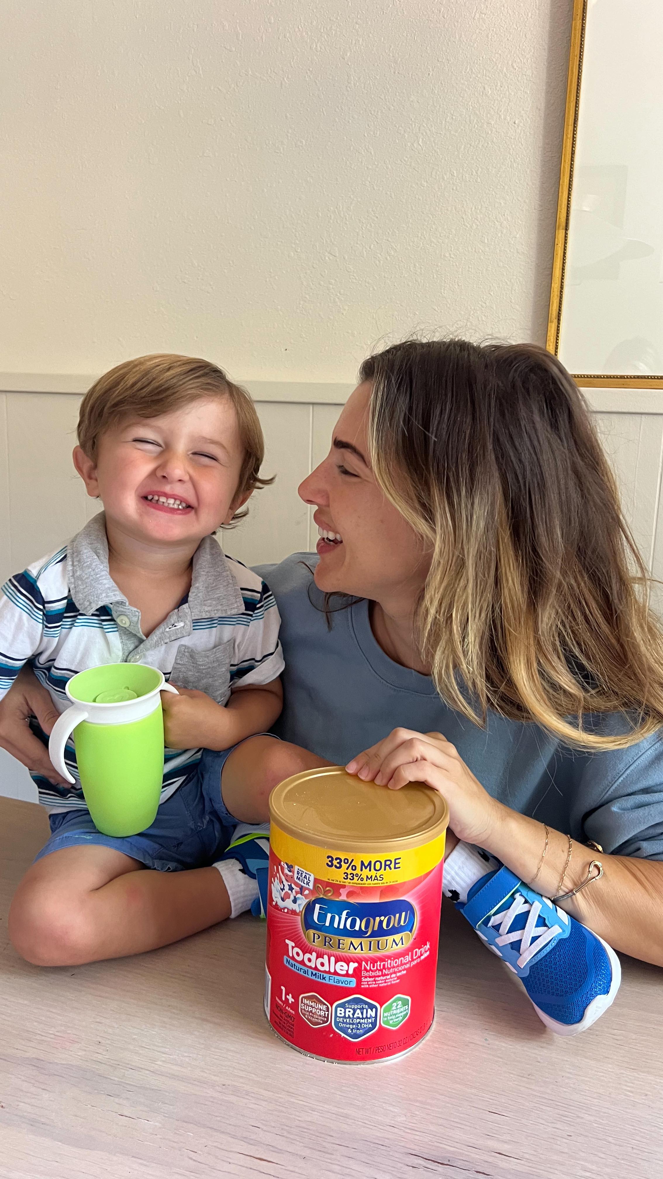 Instagram post by @aliwkay for Enfamil. Caption reads: Lane, my toddler, is always on the go and trying....