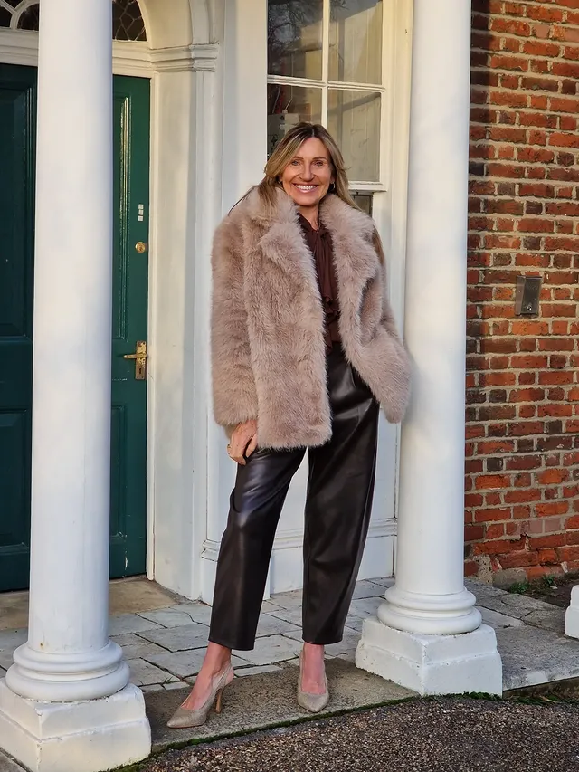 Instagram post by @tracys_fashion_style for Blue Vanilla. Caption reads: Faux Thursday 🤎

Fur and blouse....