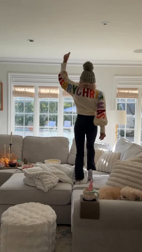 Instagram post by @caseyleighwiegand for Lovesac. Caption reads: A cozy couch and a night in… that’s my love....