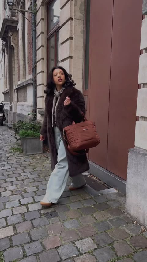 Instagram post by @phoebelourdes for Vivi Mari. Caption reads: [...] to brussels with my padded bag from....