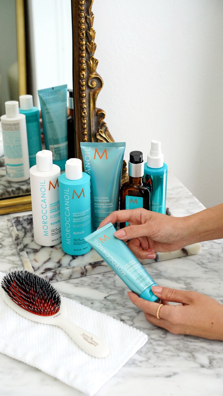Instagram post by @beautylookbook for Moroccanoil. Caption reads: My latest beauty obsession for silky soft hair is....