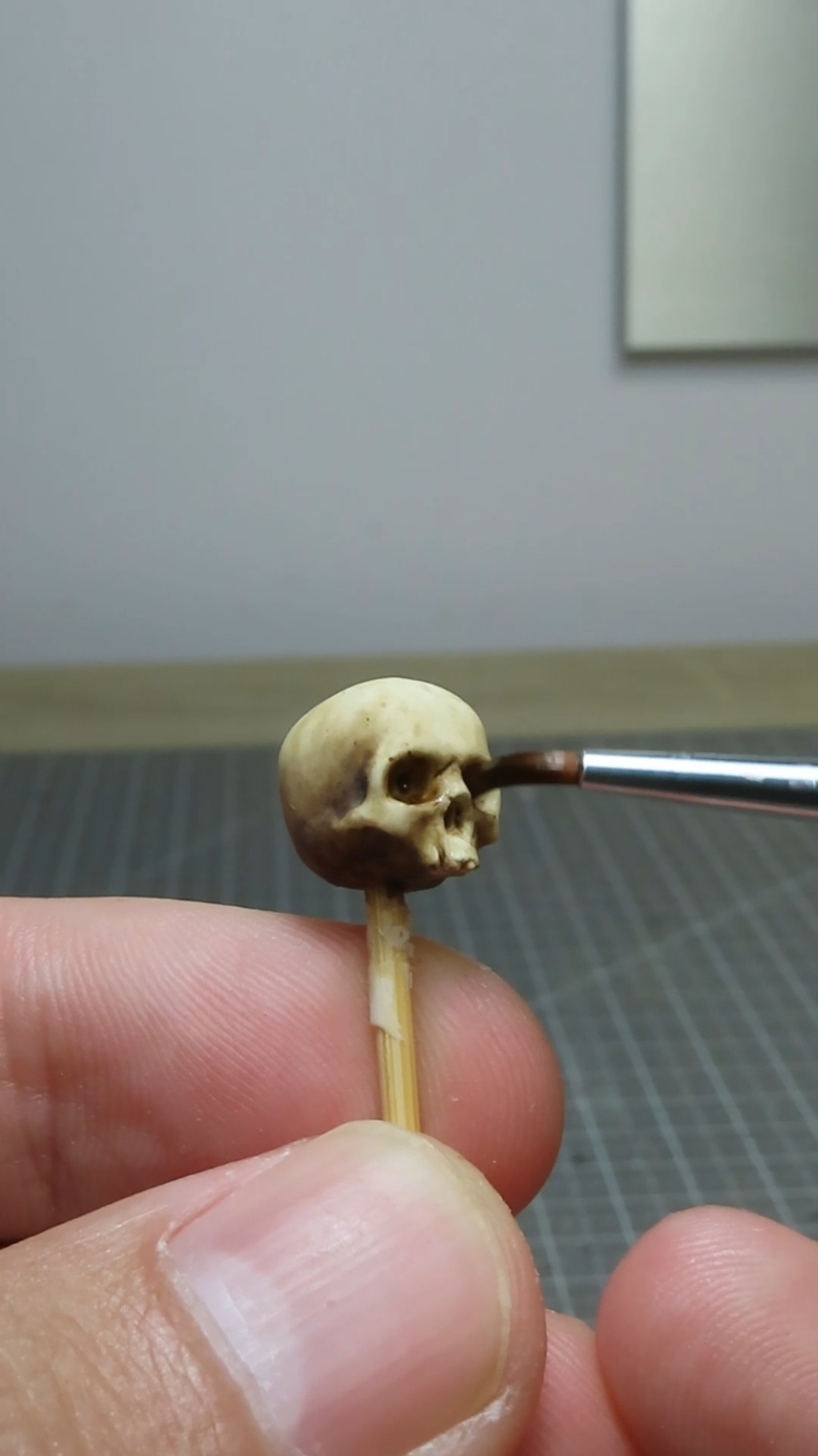 TikTok post by @oddlittleworkshop for The Army Painter. Caption reads: [...] skulls 💀 with Speedpaint 2.0 from....