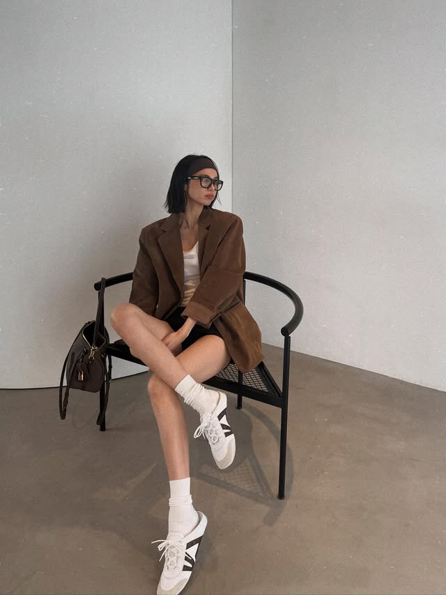 Instagram post by @sato_harumi__official for Louis Vuitton. Caption reads: 👟🤎 LV Sneakerina🕊️ #LOUISVUITTON #LVFashion....