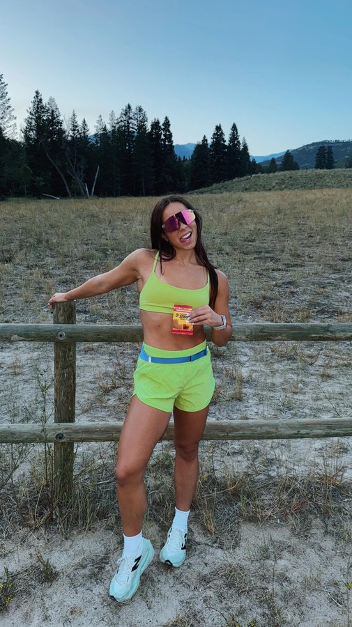 Instagram post by @lizzie.ramey for Honey Stinger. Caption reads: Nobody is obsessed with @honeystinger peanut....