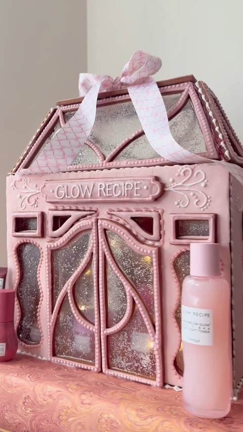 Instagram post by @jackelinnepastry for Glow Recipe. Caption reads: #ad Not your average gingerbread house, meet the....