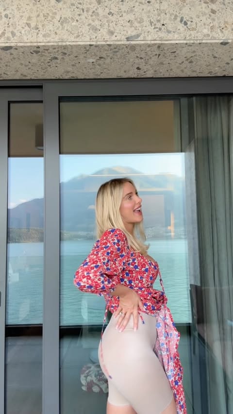 Instagram post by @hjgflanagan for Kurt Geiger. Caption reads: [...] moment 😂 Dress @cocofennell Bag @kurtgeiger....