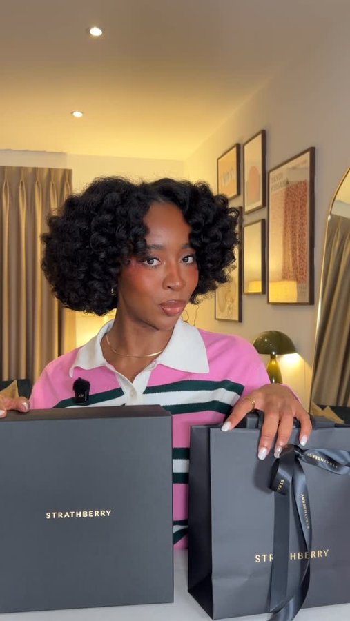 Instagram post by @nucchi_ for Strathberry. Caption reads: Our favourite kind of day! A new bag  to unbox 😌✨....