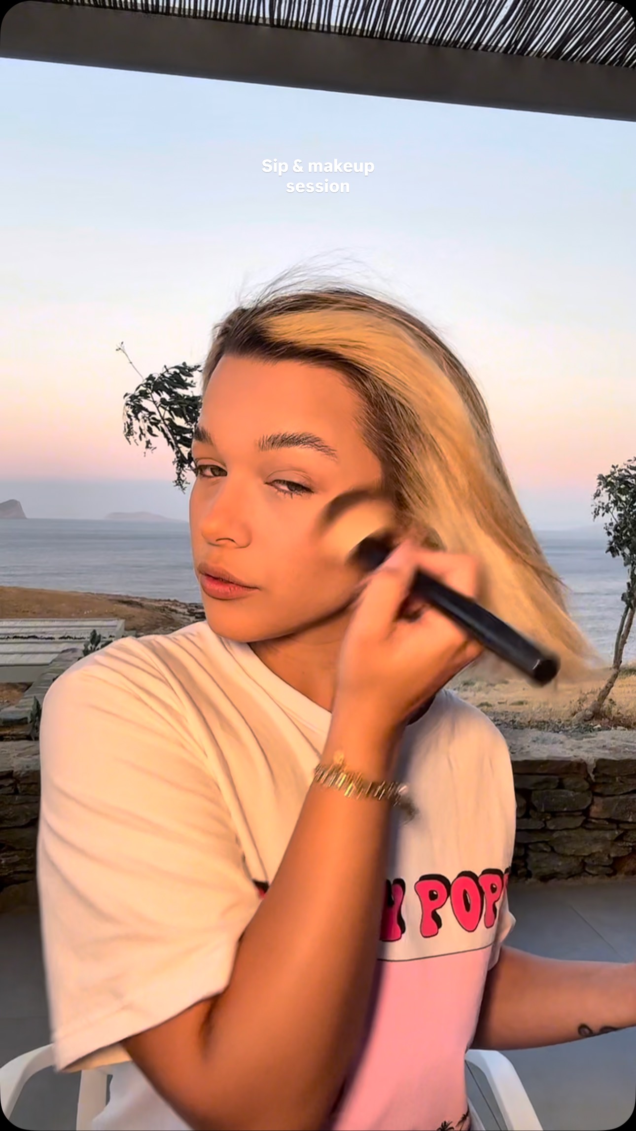 Instagram post by @christianna_mi for Aperol Spritz. Caption reads: #ad sunset sip and grwm στο νησι ✨ δοκίμασα ολα τα....