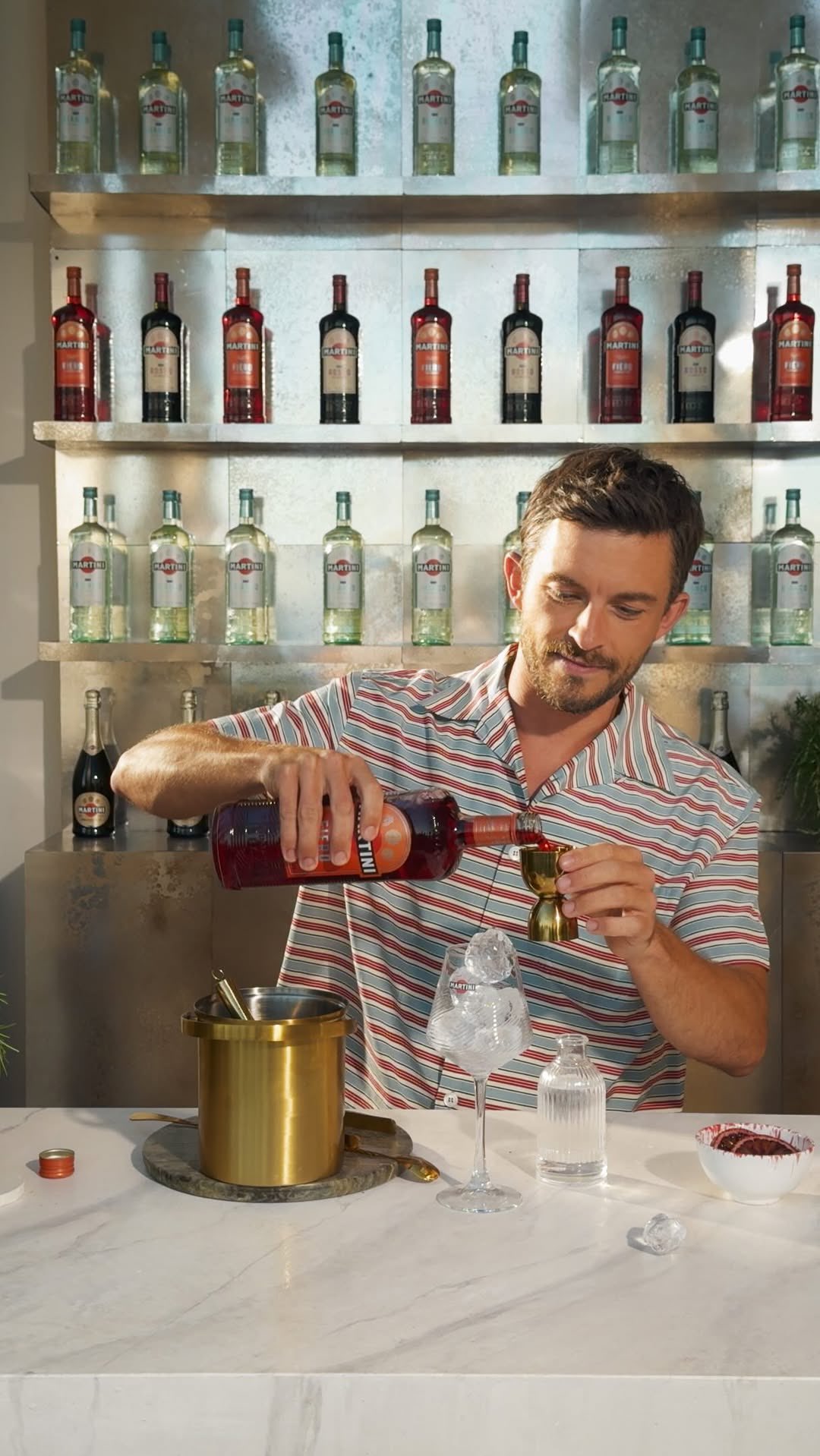 Instagram post by @jonathanbaileystan for MARTINI. Caption reads: Lear how to do a Martini Fiero & Tonic with Jonny....