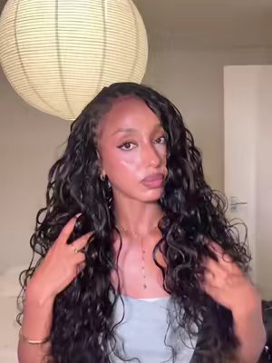 TikTok post by @ada_dawit for Wavymy. Caption reads: [...] time. Used 5 packs of the 26” bodywave.....