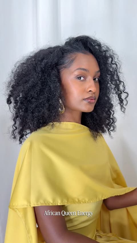 Instagram post by @crys4inc for JardinVue. Caption reads: African Queen Energy 💛 Dress : @jardinvue Code....