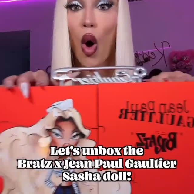 Instagram post by @kerricolby for JeanPaulGaultier. Caption reads: Bratz x @jeanpaulgaultier 💋✨ Let’s unbox this....