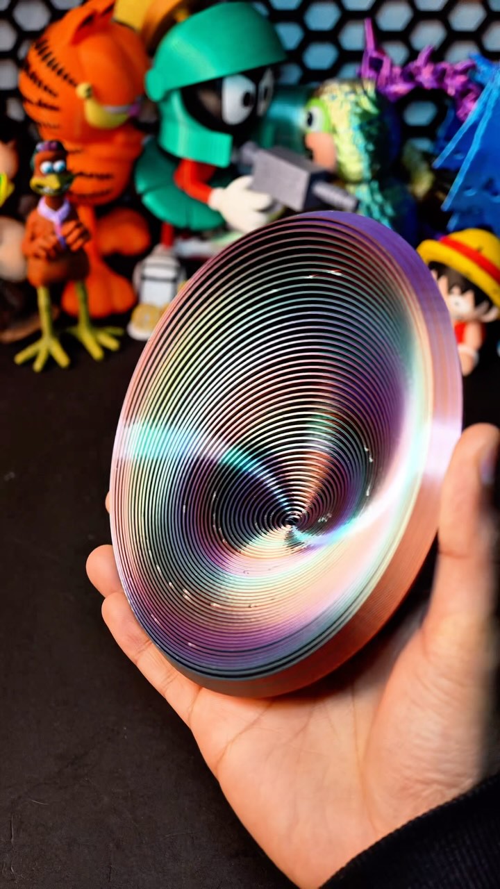 Instagram post by @printsculptors for CapCut. Caption reads: 3D-Printed Circle Layered Fidget.
📁File:....