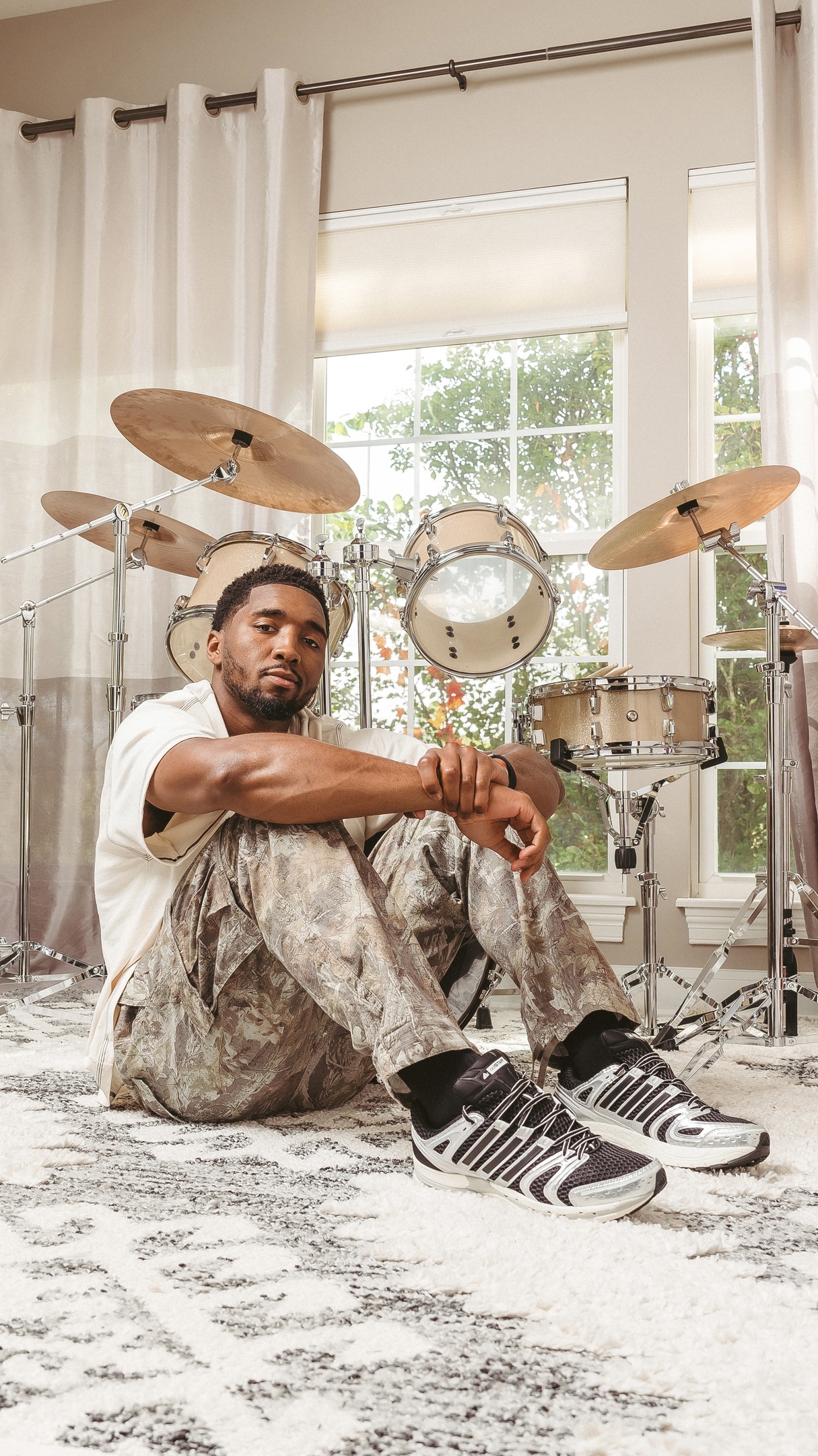 Instagram post by @spidadmitchell for Champs Sports. Caption reads: Looking for the perfect gift? @spidadmitchell has....