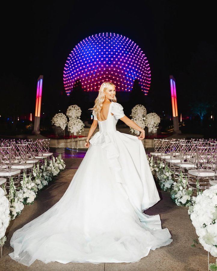 Instagram post by @kristinschnacky for Allure Bridals. Caption reads: [...] Epcot in the brand new 2024 Disney....