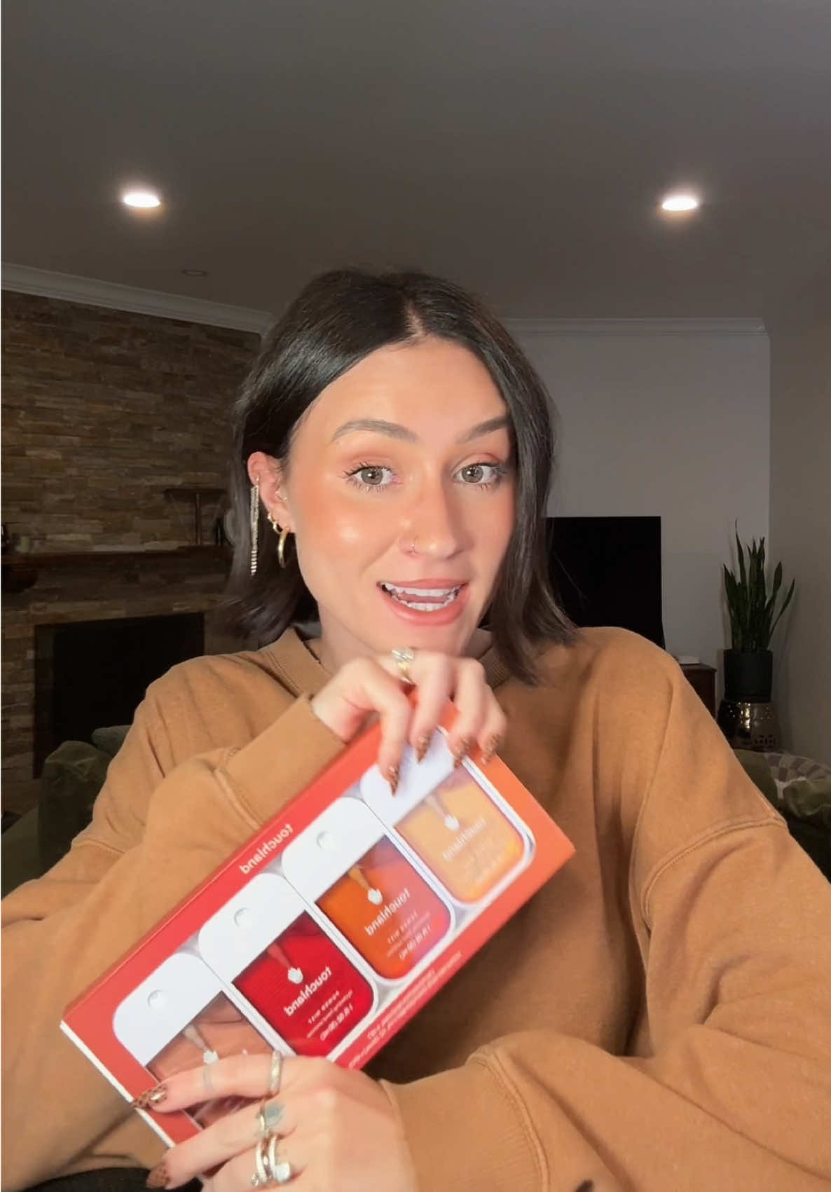 TikTok post by @paigeejenna for Touchland. Caption reads: The perfect gift for the holidays is on sale for....