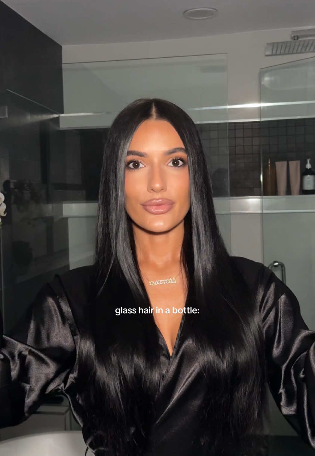 TikTok post by @thespinaparianos for IGK Hair. Caption reads: not sponsored!!!!! one of my favorite “glass hair”....