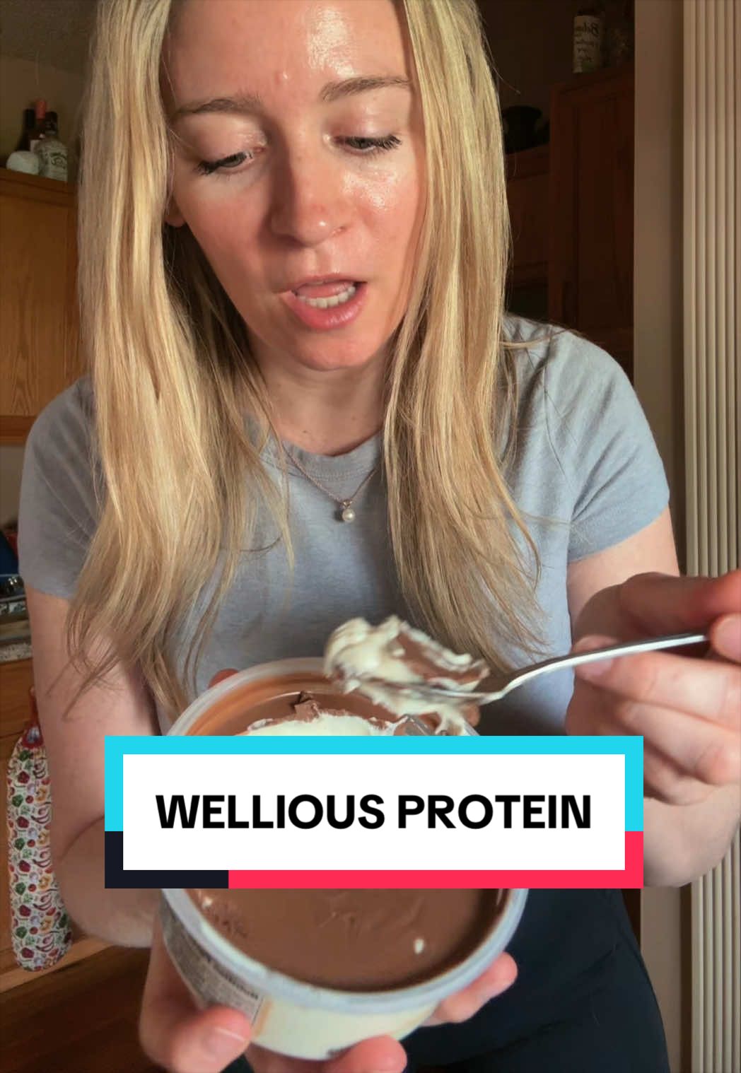 TikTok post by @aussiegander for Wellious. Caption reads: So good… @Wellious #protein #almondprotein....