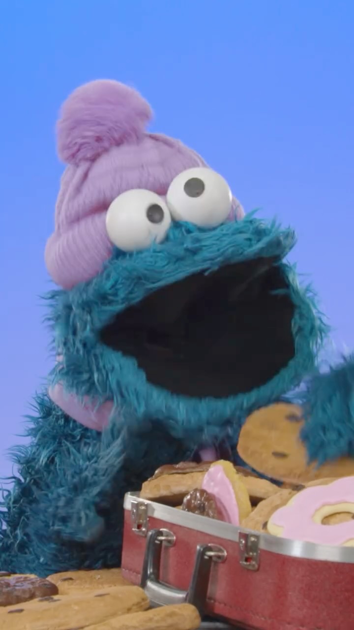 Instagram post by @cookiemonster for Sesame Street. Caption reads: From Sesame Street to the snowy slopes of Italy,....