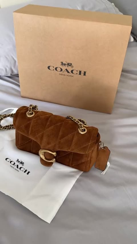Instagram post by @misserrricka for Coach. Caption reads: Unboxing my new coach bag that I got for Christmas....