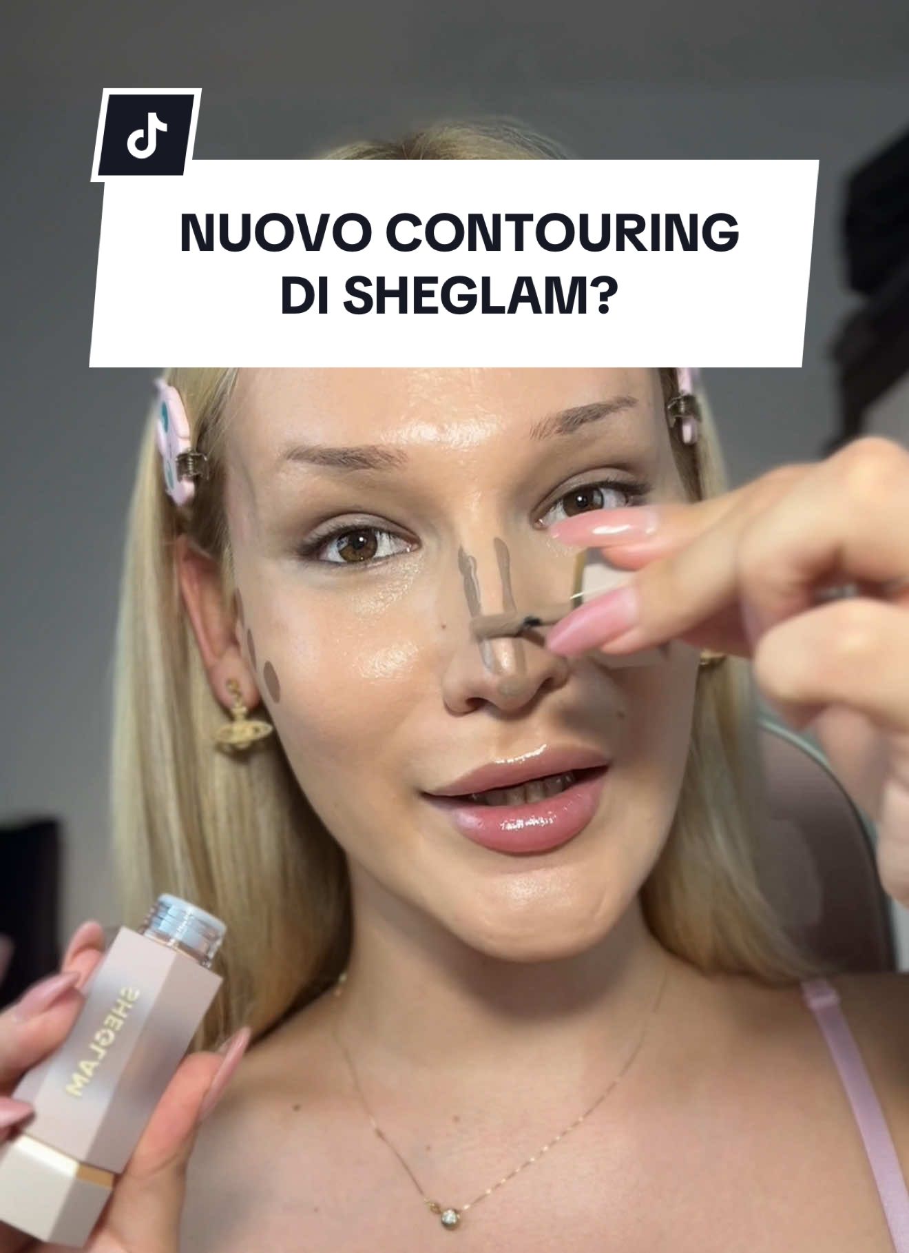 TikTok post by @psychelangelo for SHEGLAM. Caption reads: Nuovo contouring di @SHEGLAM con 2 punte al posto....