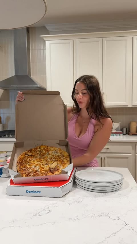 Instagram post by @makenzierencher for Domino's Pizza. Caption reads: #ad @dominos 50% off menu-priced pizzas is a....
