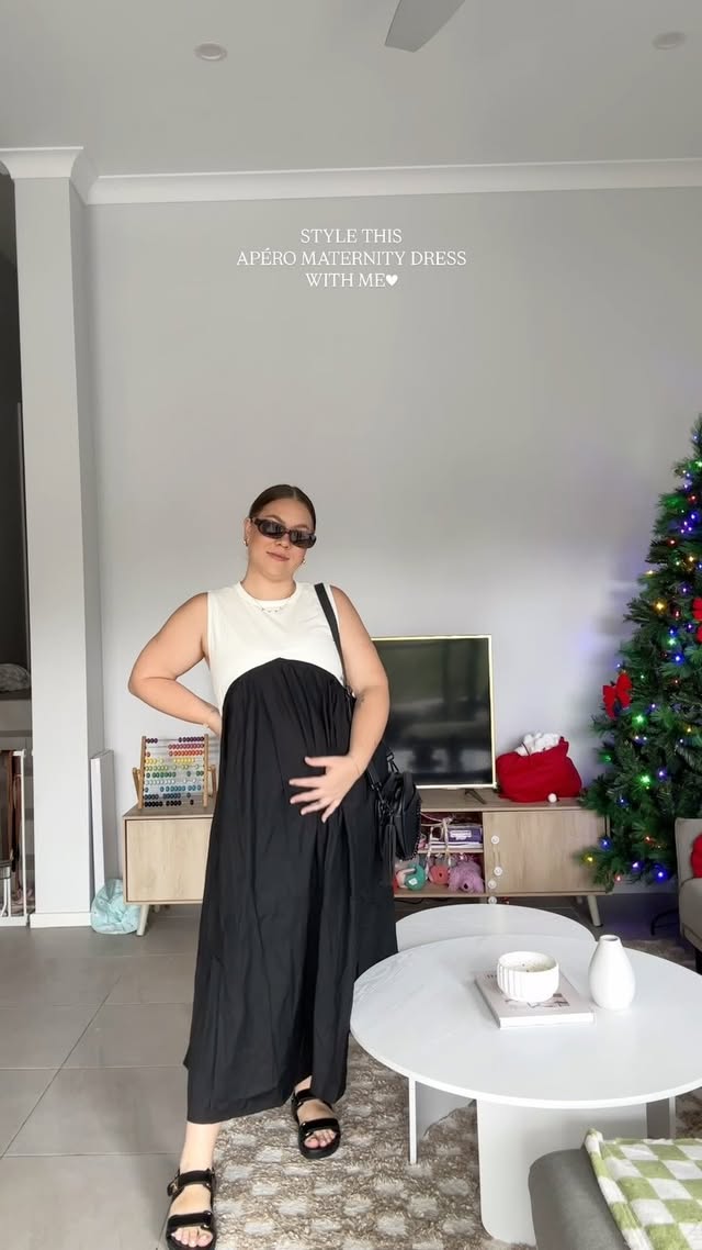 Instagram post by @sarahbettiens for Apéro Label. Caption reads: My first piece of actual ‘maternity’ clothing🖤....