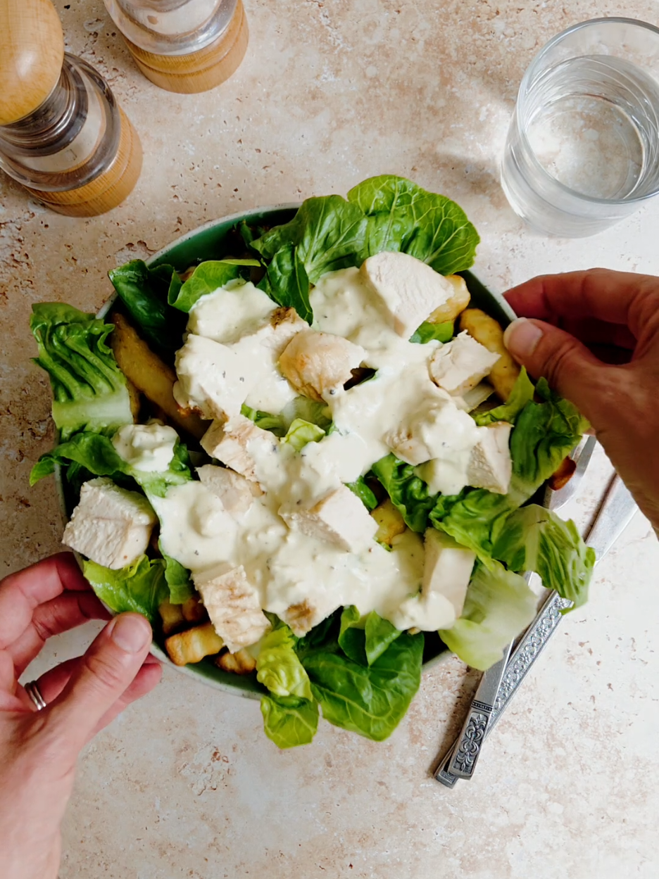 TikTok post by @searchingforspice for SwanbrandSA. Caption reads: If garlic butter chips loaded with caesar salad is....