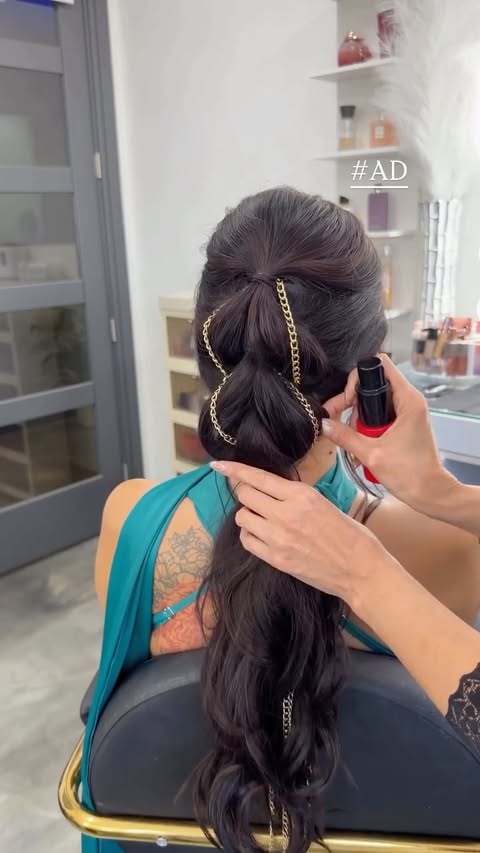 Instagram post by @samirasjewelry for SalonCentric. Caption reads: [...] with a twist of chains ✨🎄. I partnered with....