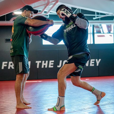 Instagram post by @khamzat_chimaev for RDX Sports. Caption reads: Thank you for good training coach @johnboyboxing....