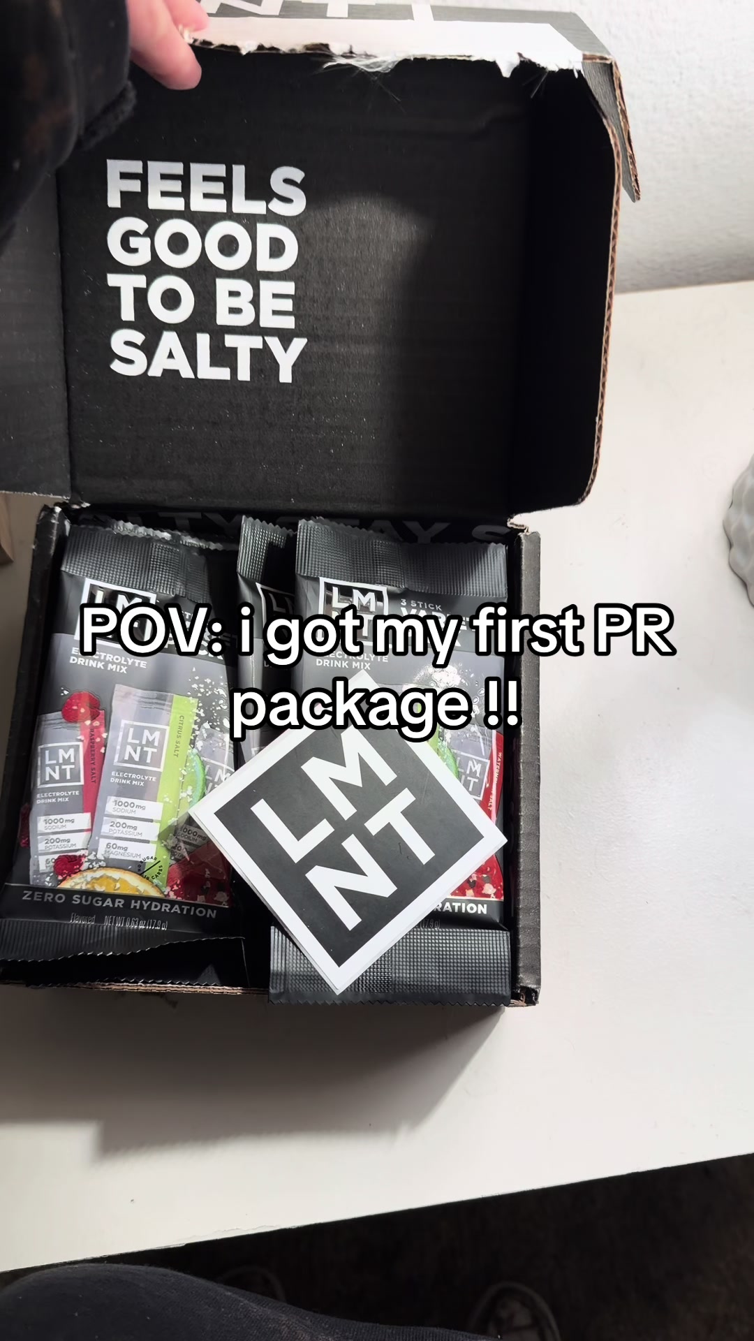 TikTok post by @sunnyfranklin for LMNT. Caption reads: @Drink LMNT 🤍 MY FIRST PR PACKAGE AH!! can’t wait....