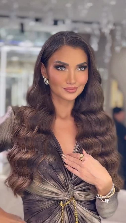 Instagram post by @hiba.haidari for Elisabetta Franchi. Caption reads: My look for hosting the launch of Guerlain’s new....