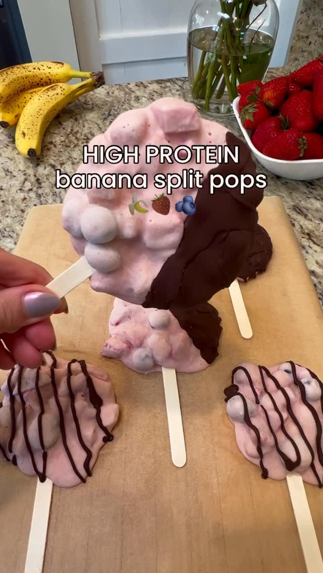 Instagram post by @brit_lumley for EarthChimp. Caption reads: High protein banana split pops 🍌🍓🫐 

It’s....