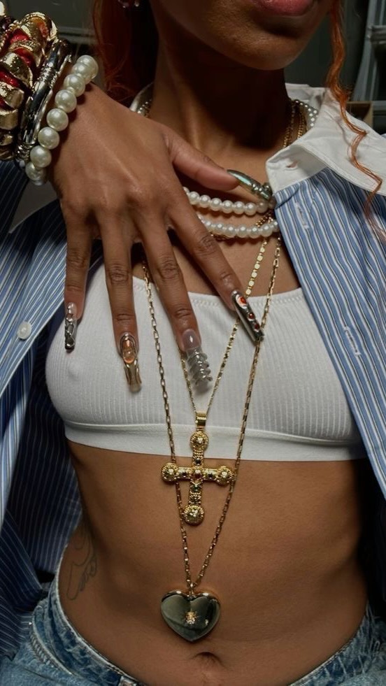 Instagram post by @thatssomaniiii for Burlington. Caption reads: How to style a maxi skirt three ways....