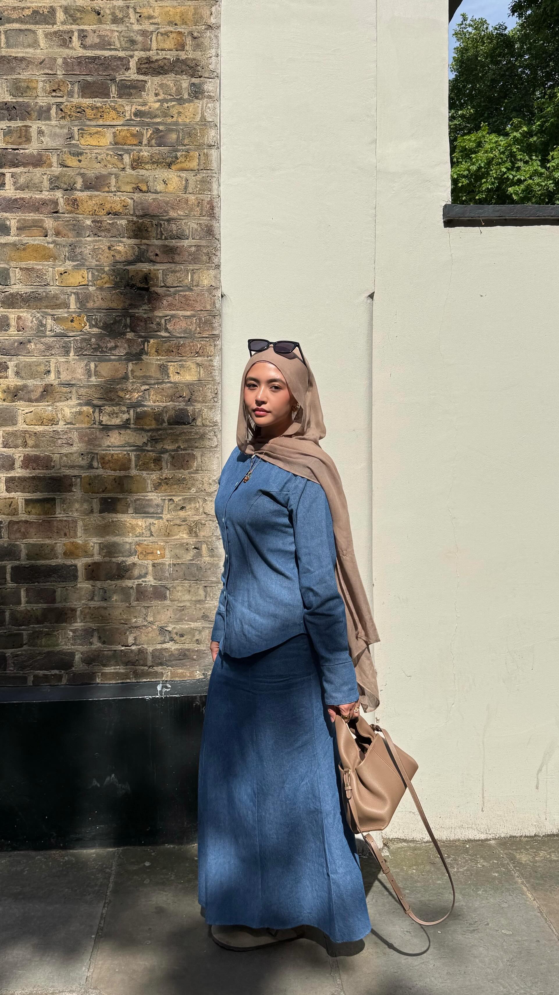 Instagram post by @jawdamodest for Schuh. Caption reads: my new favourite denim set @jawdamodest 💙.